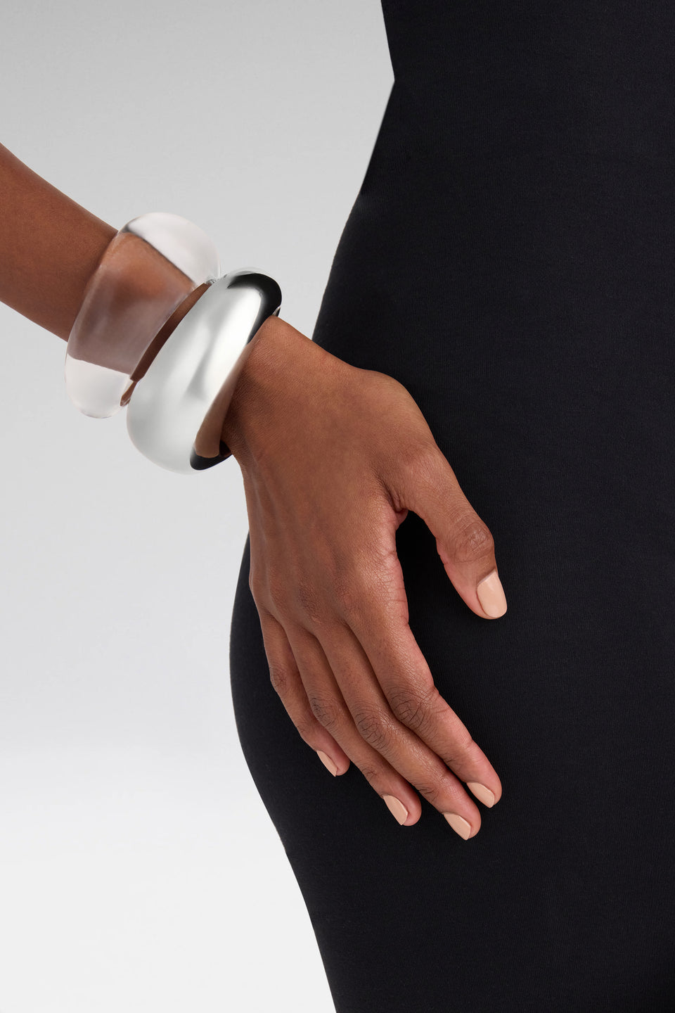 Gemini Cuffs Silver Metal And Plexiglass Base