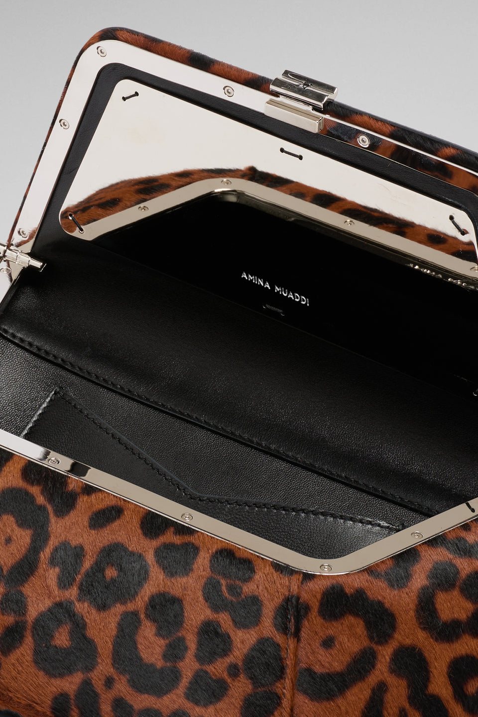 Leopard printed pony clutch bag