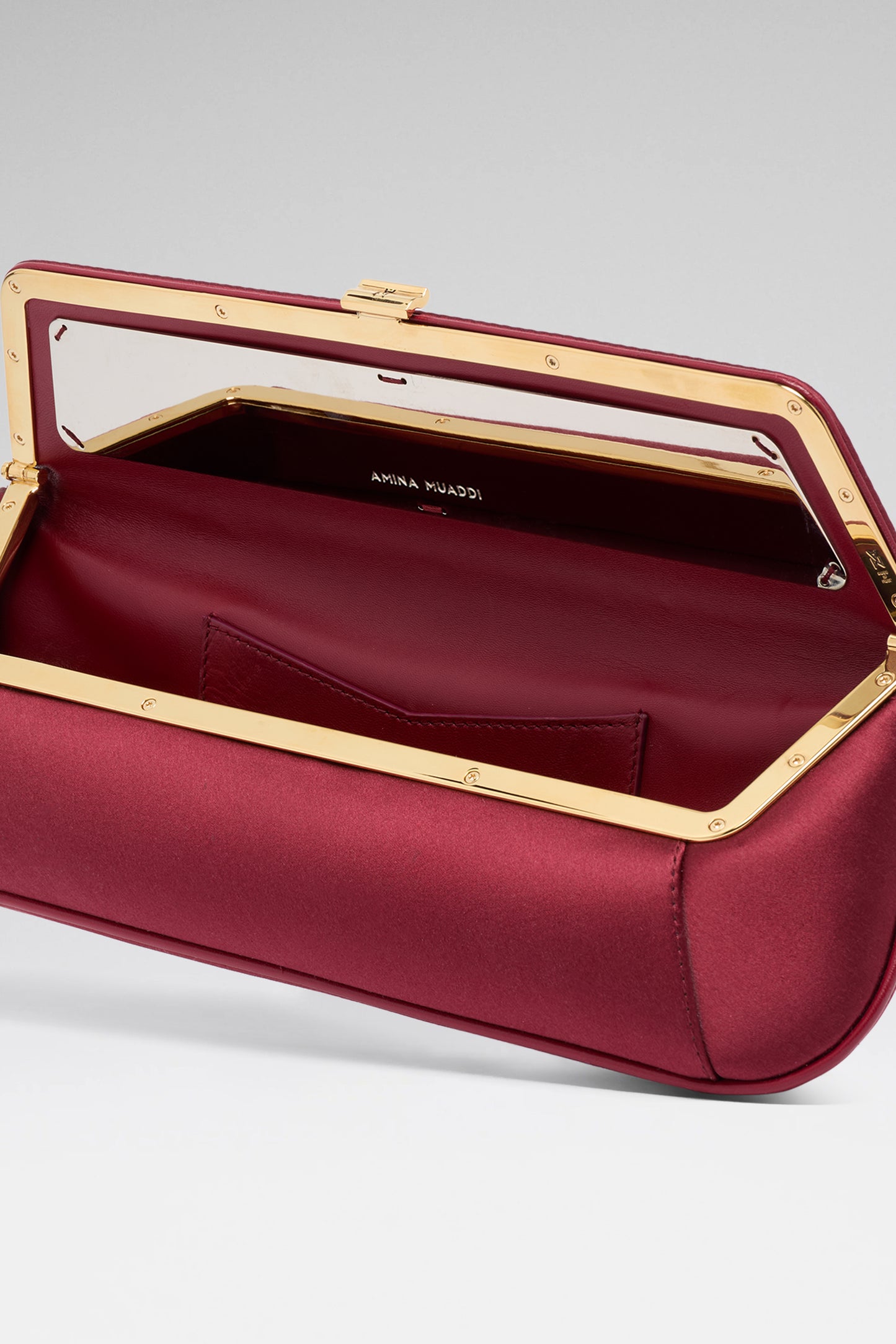 Ami designer clutch bag Amina Muaddi