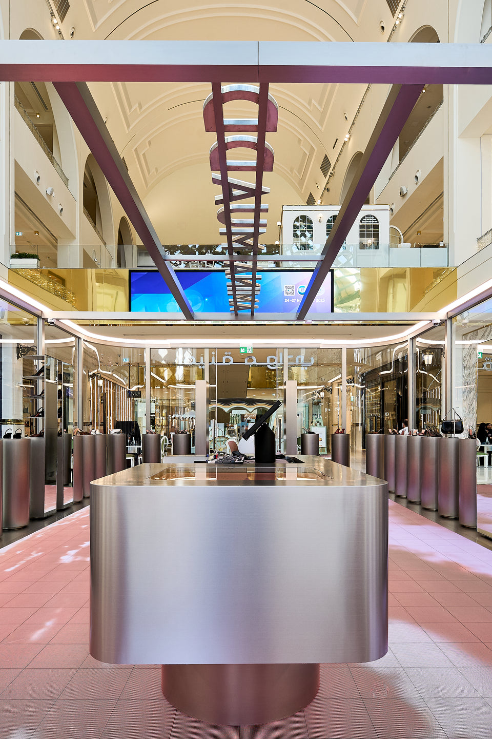 Amina Muaddi flagship at Place Vendome Mall in Doha. Luxury heels and luxurt bags