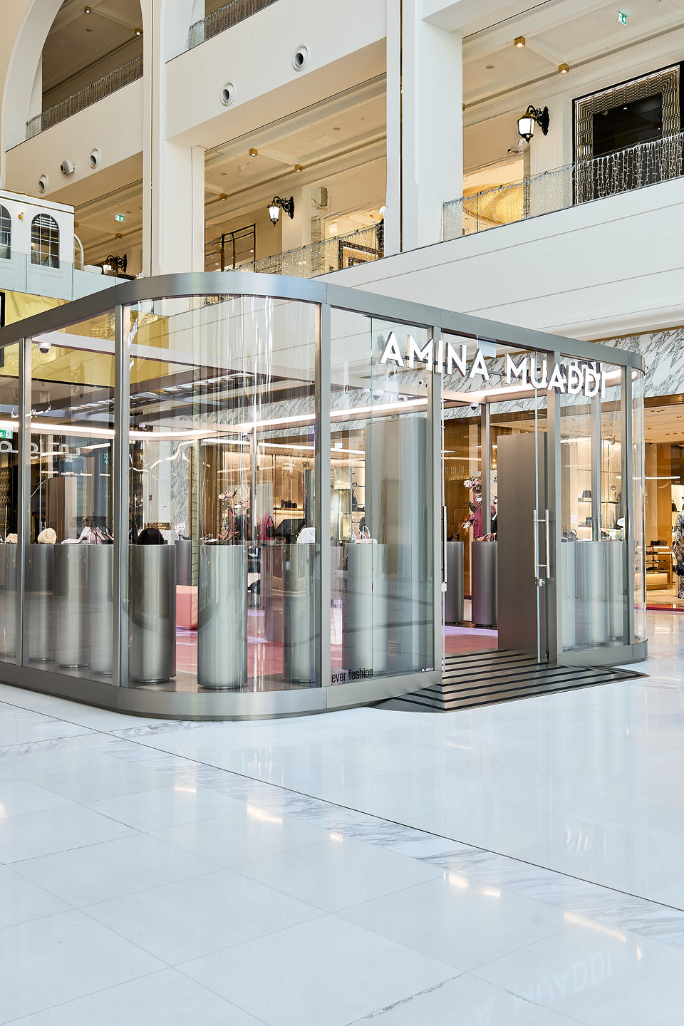 Amina Muaddi boutique at Place Vendome Mall in Doha, showcasing luxury heels