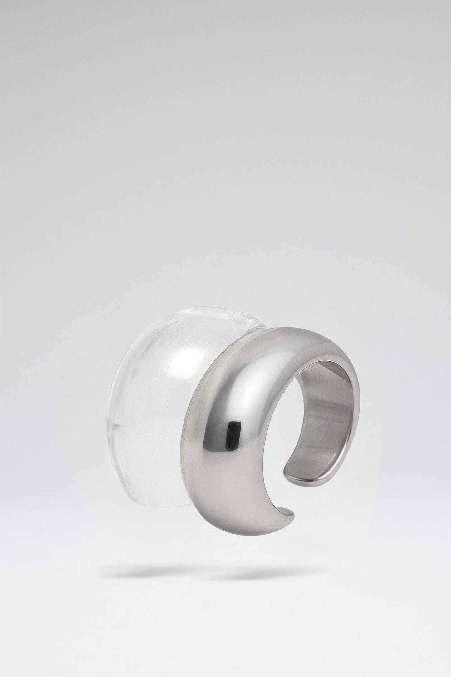 Gemini Cuffs Silver Metal And Plexiglass Base