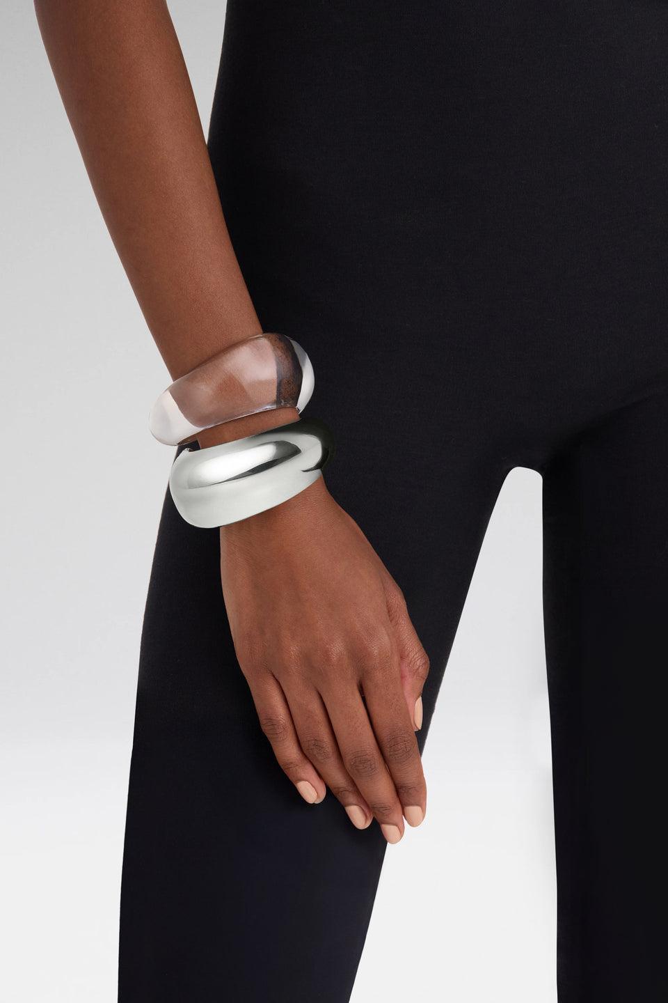 Gemini Cuffs Silver Metal And Plexiglass Base