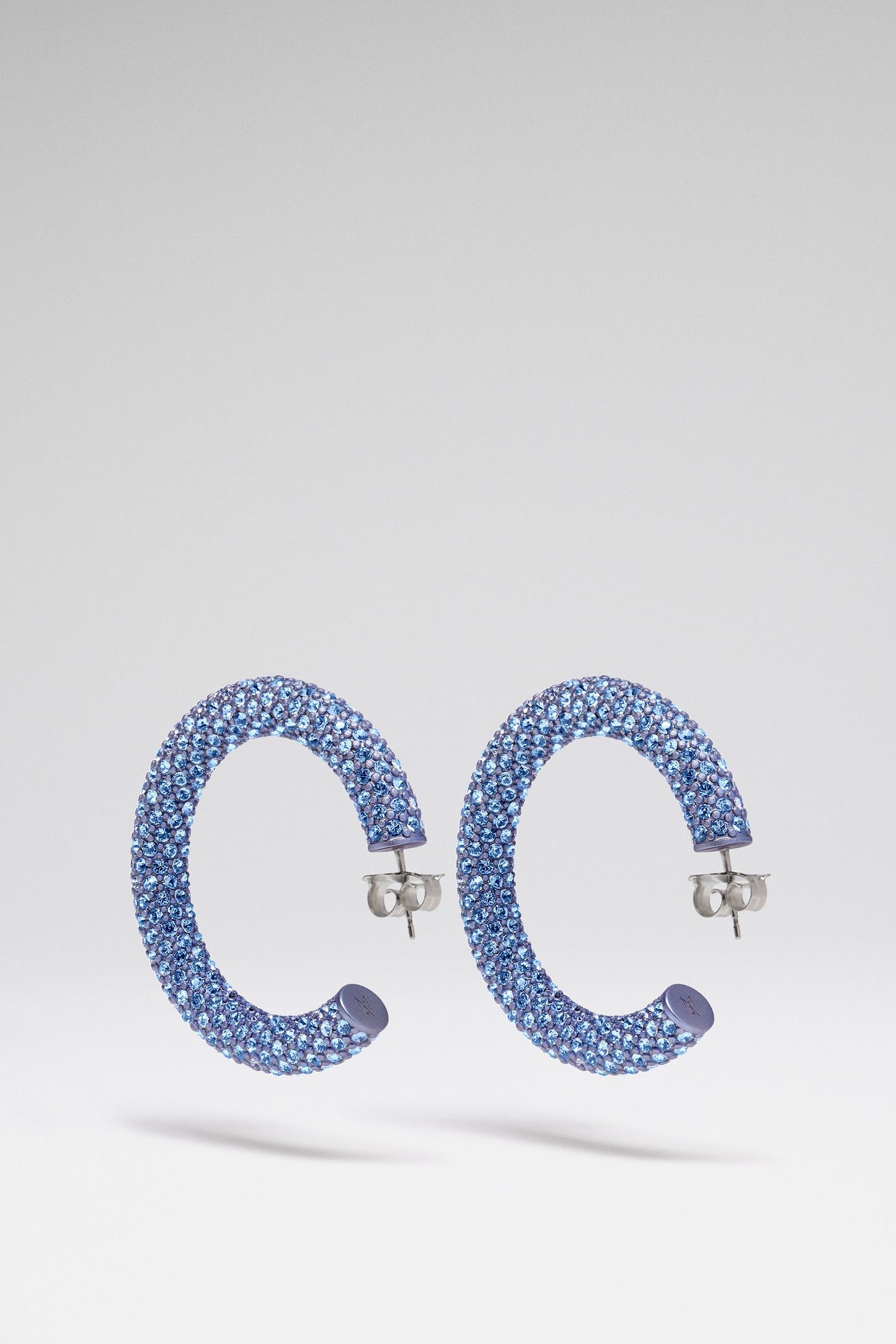 Cameron Hoop Medium Light Sapphire Crystals With Light Sapphire Chrome Base